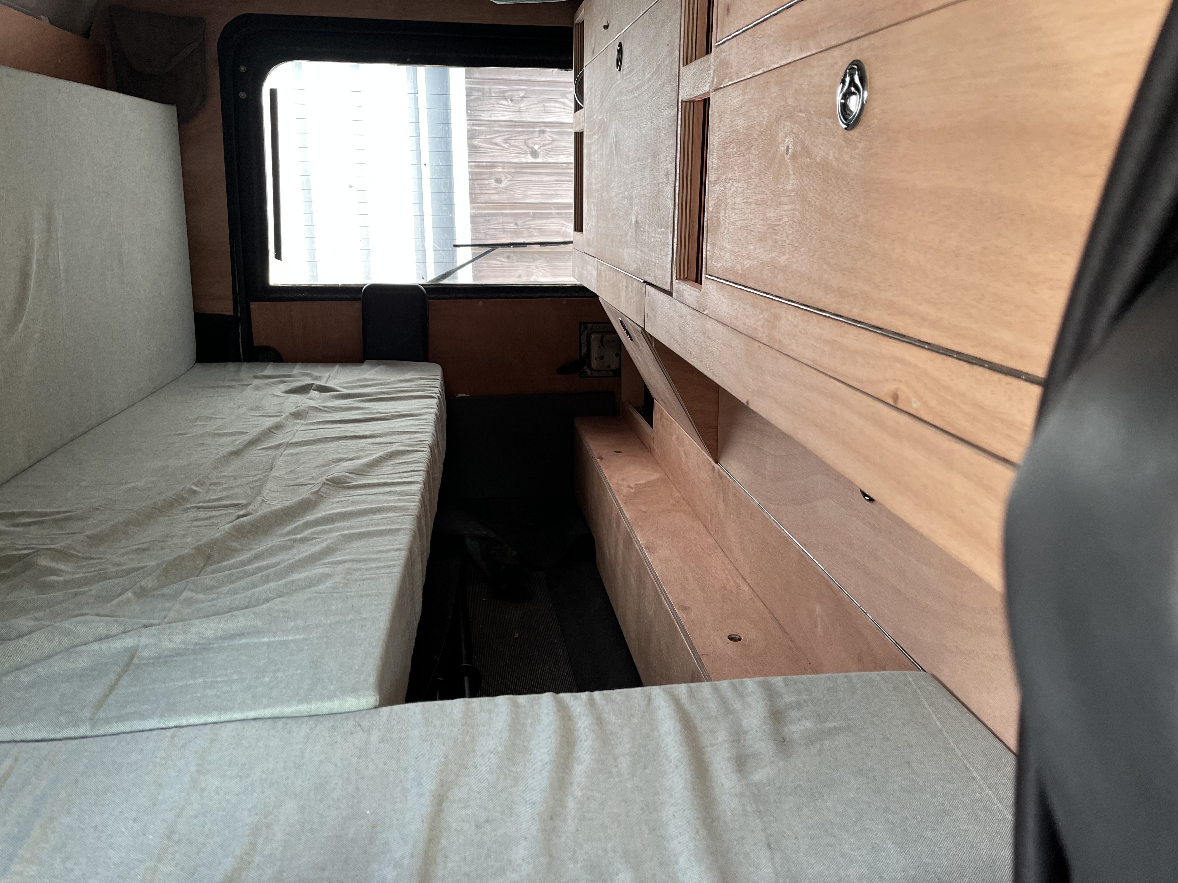 Defender 4/6 Land Rover Defender aménagé par Van Aménagement